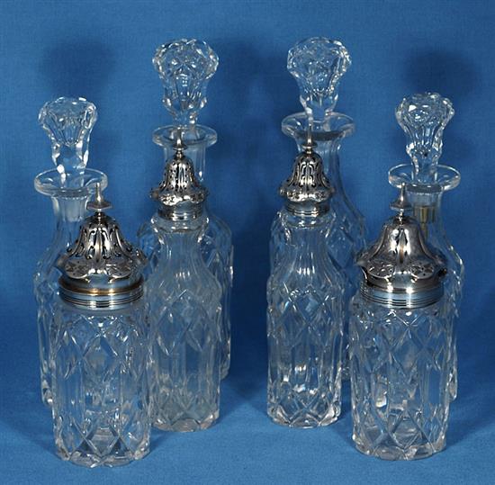 A Victorian silver eight bottle cruet stand and eight original bottles, by Walter & John Barnard, height 280mm, weight 40oz